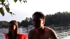 Seductive temptress is giving a blow job on the boat to a guy