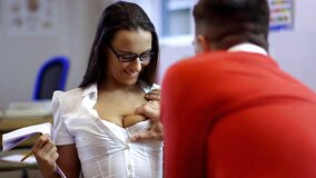 A slut is shaking her tight ass for her friend in the classroom