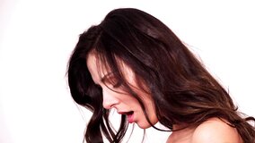 Two girls kiss one another and they make sexy noises as they do it